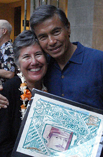 Leilani Holmes shares her award with husband Ivan Holmes, designer of Ancestry of Experience.